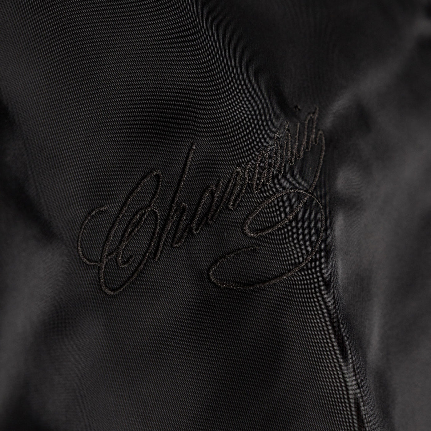 Blouson aviateur en satin Adidas x Willy Chavarria